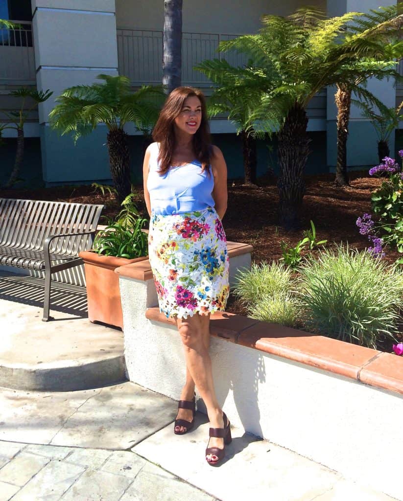 Blue silk top and floral skirt