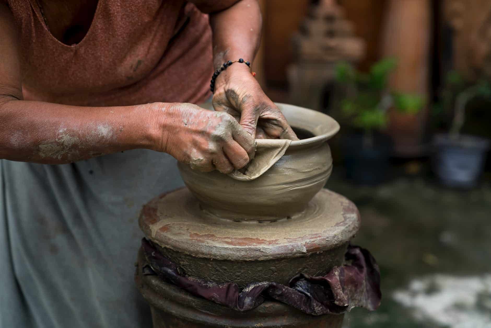 woman making clay pot - inspiring women 