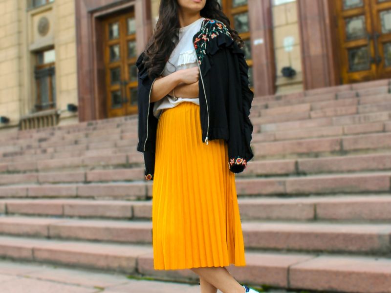 Pleated skirt and embroidered jacket