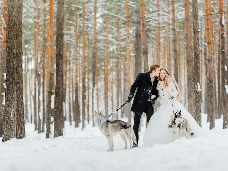 Beautiful wedding in the snow Things To Consider When Asking Your Wedding Guests To Travel