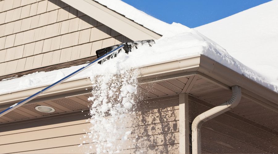 Raking snow off roof