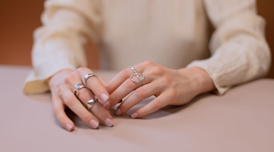 Wearing silver rings