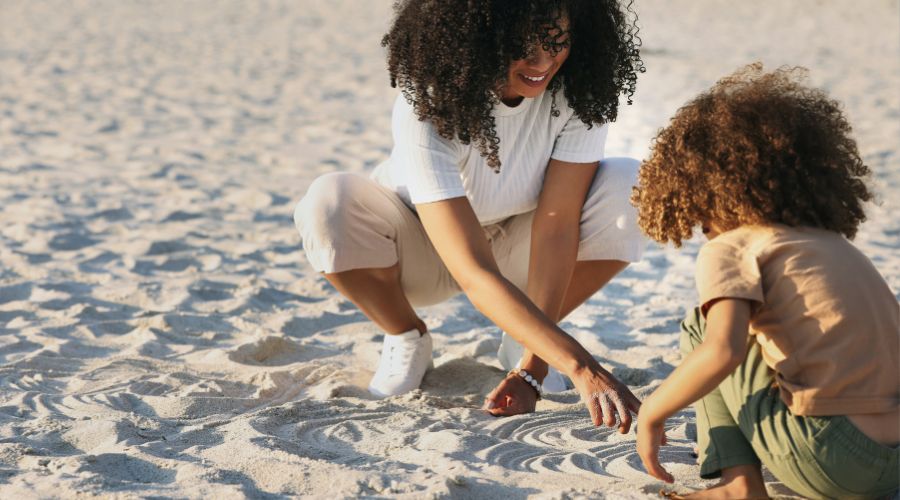 Vacation Bliss for Mums and Little Ones playing in the sand