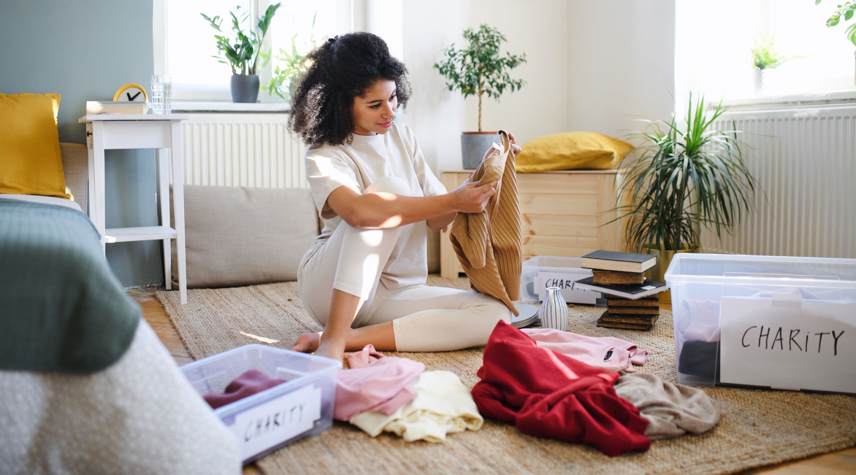 Woman sorting clothes